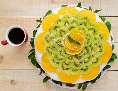 水果蛋糕欧兰果kiwi薄荷加一杯咖啡图片