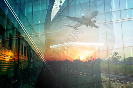 商人持有平板电脑和火车飞机作为商务运输商务旅行或物流概图片