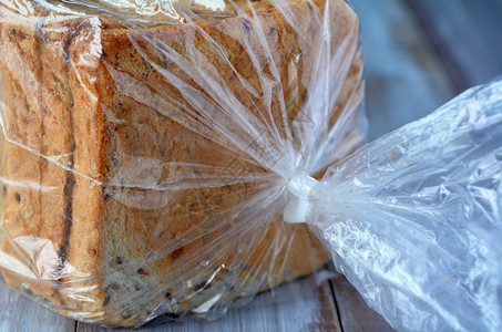 包装袋中新鲜的切片面包食物背景和有复图片