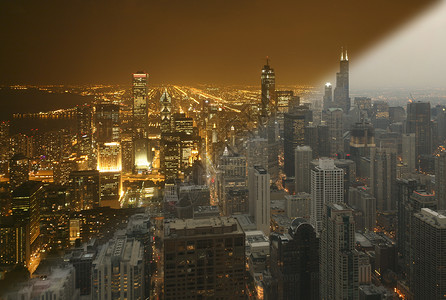 芝加哥市中心空中天线日落至夜间从高图片
