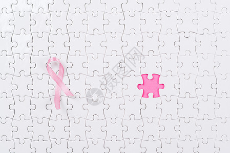 粉红丝带和拼图块乳腺癌图片