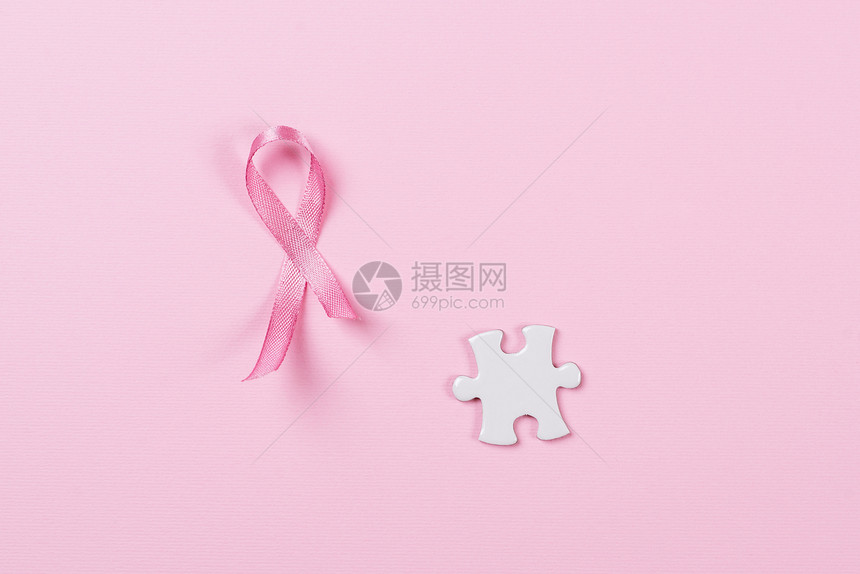 粉红丝带和拼图块乳腺癌图片