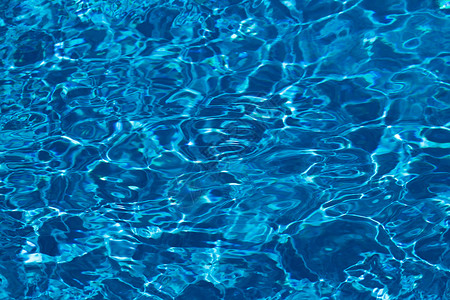 游泳池或海和滩的浅蓝色或绿色水背背景图片