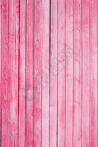 木板上旧漆红色的质感背景图片