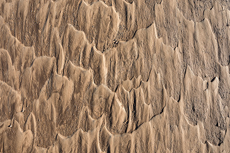 沙滩上流水的痕迹图片