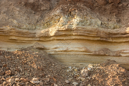 石头和土壤黄沙层地球的更深图片