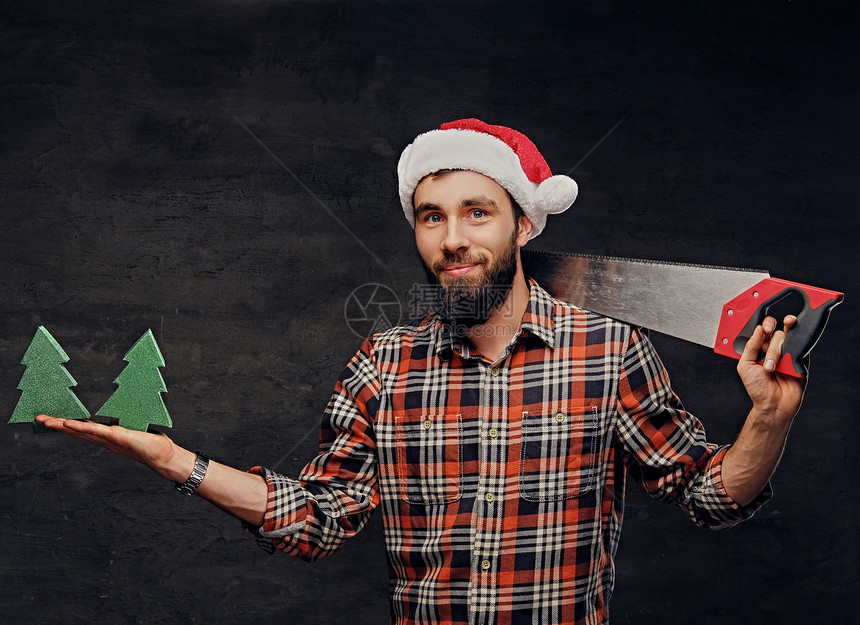圣诞现场穿着圣诞老人帽子的正胡子男戴着装饰合身的图片