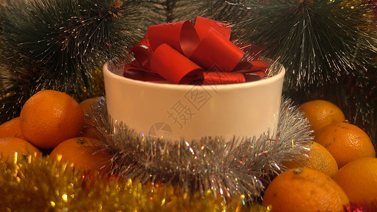 新年橘子树枝和礼物高清的圣诞组合背景图片