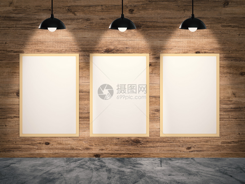 三个空白框架挂在木墙上图片
