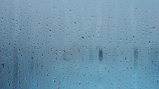从雨滴纹理背景的蓝色水图片