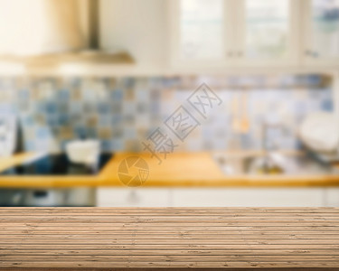 厨房背景模糊的木制台面背景图片