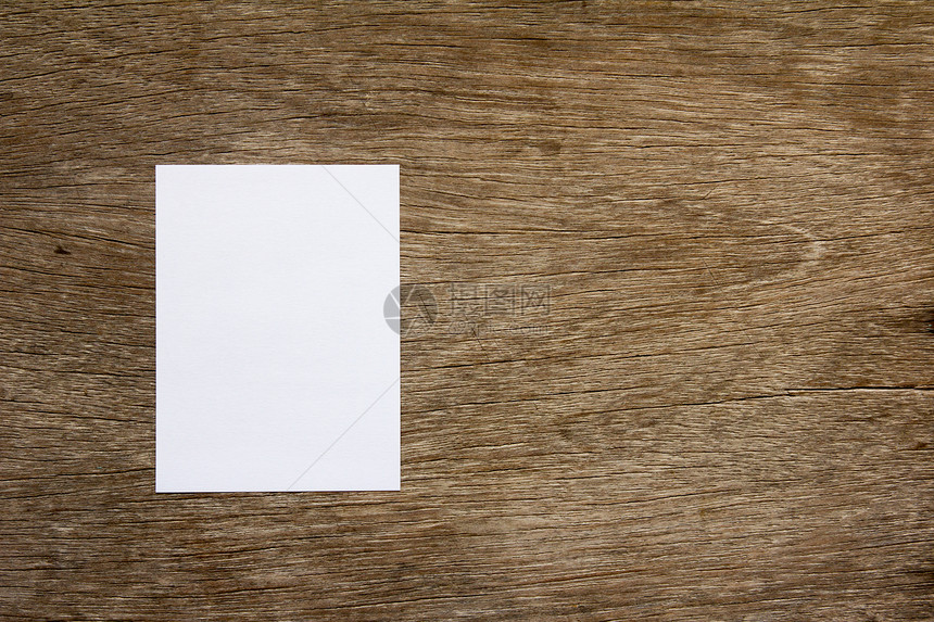 关于褐木背景的空白纸备图片
