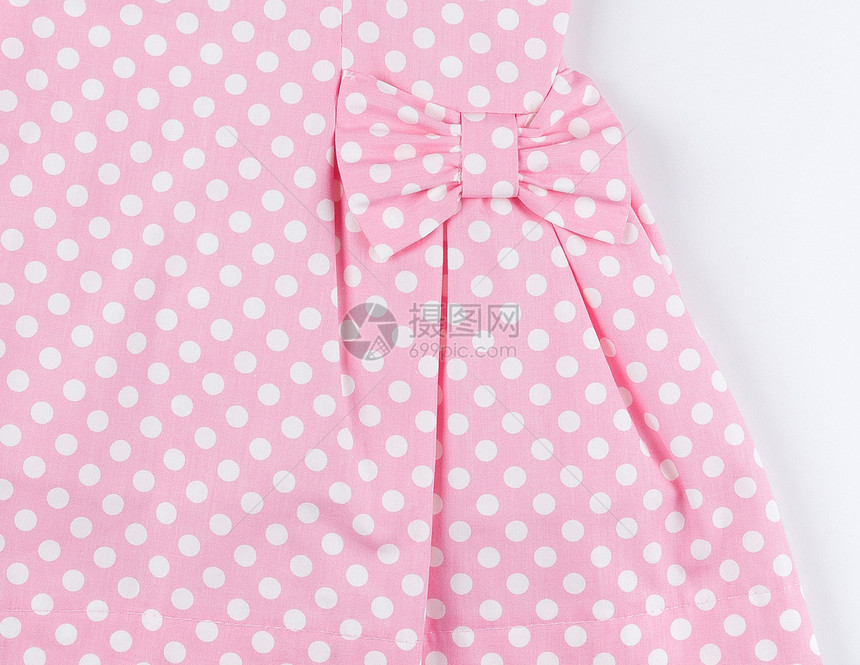 粉红色裙子的一部分带有波卡点模图片