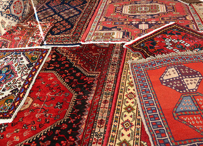 市场上出售的不同国籍和质量的地毯背景图片