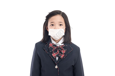 亚洲患病女孩用面罩保护流感图片