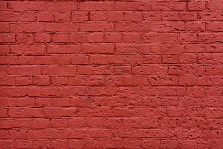 红棕色彩绘砖墙复古背景图片