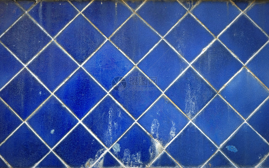 老蓝色陶瓷墙壁背景图片