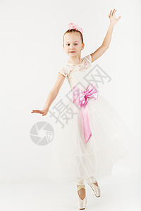 美丽的芭蕾舞演员孤立在白色背景上穿着白色连衣裙和足尖鞋的苗条图片