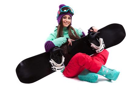 身穿紫色滑雪服红色长裤蓝色雪地靴和紫色羊毛帽的白人迷白女孩与世隔绝图片
