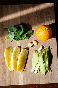 橙子菠萝菠菜绿色鳄梨和木图片