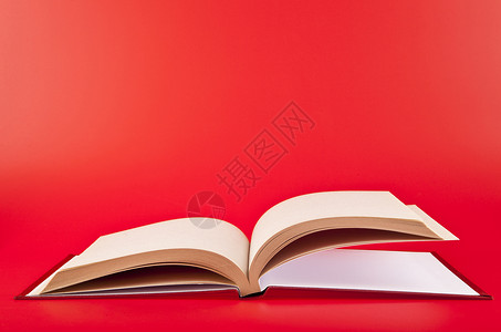 红色背景的书背景图片