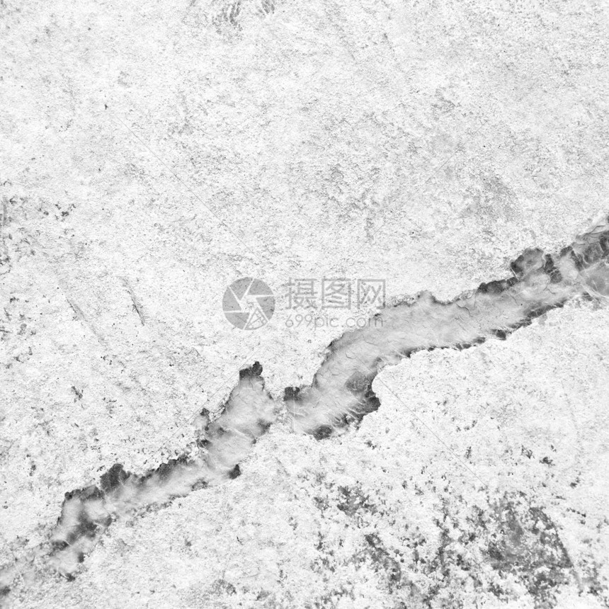 奥曼沙漠中破碎的沙石裂开的黑白近身镜图片