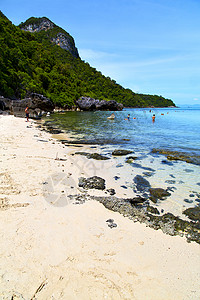 白沙滩海滨岩石船泰兰和南海图片