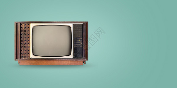 复古电视彩色背景上的旧老式电视复古技术平躺图片