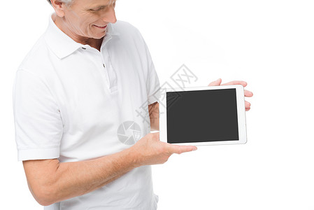 高级男子用空白屏幕显示数字平板电脑图片