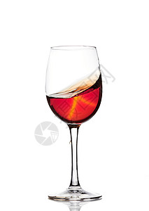 经典杯红酒孤立在白色背景上将红酒溅入玻璃杯中一杯红酒飞溅图片
