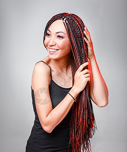 女人的发型有色彩多的头发延伸以薄色图片