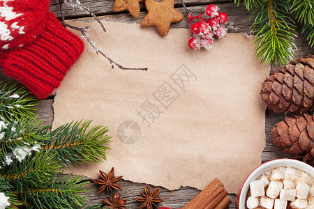 圣诞节愿望咖啡和雪树的一块纸带有空图片