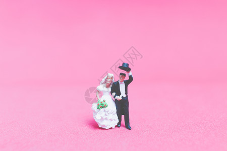 以粉红背景情人节概念为主题的小型婚礼图片