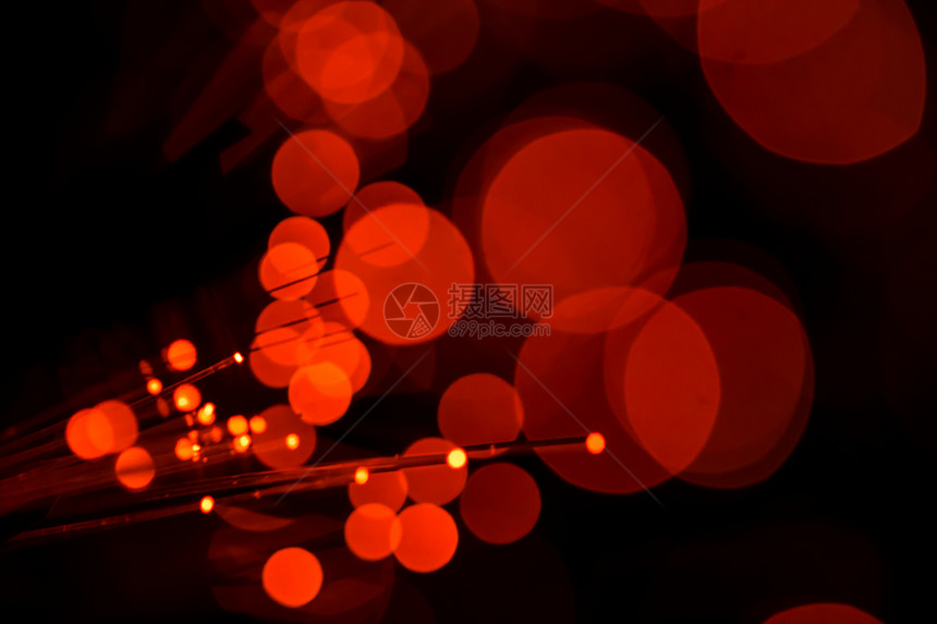 红灯带纤维光的片背景模图片