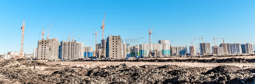 起重机和在建的现代房屋图片