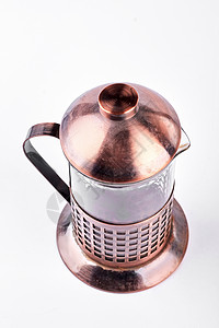 白色背景的玻璃茶壶老法国记者制茶机在白色图片
