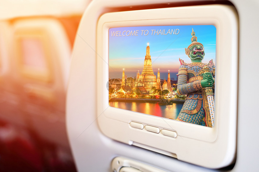 在客座前的飞机监视器显示泰国旅行后春草概念组织TravelbackgroudNa图片