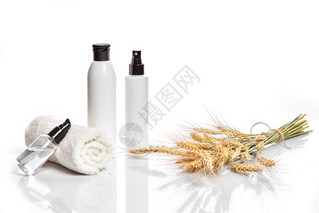 草本和矿物护肤品一罐奶油小麦油白色化妆品瓶无标签广告化妆品的概念静图片
