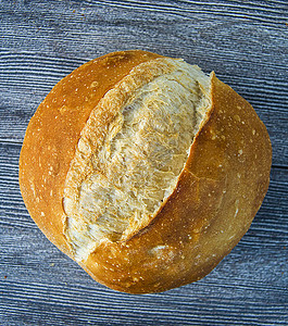 不同的面包面包芝麻新鲜面包火鸡特定类型的面包木地板上的图片