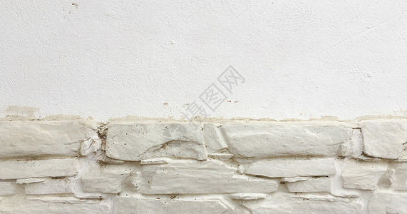 石墙背景白漆的石墙纹理作为背景图片
