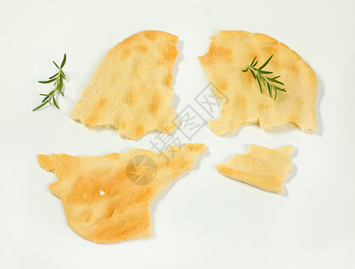 白色背景的四块传统托斯卡纳扁面包GhiottinaTo图片
