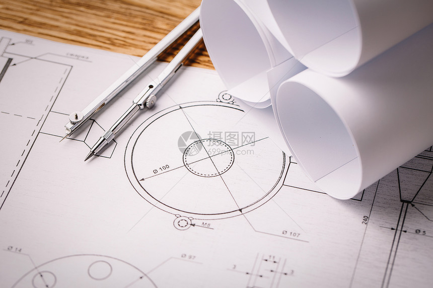 建筑绘图和绘图辊和工作台上的绘图工具图片