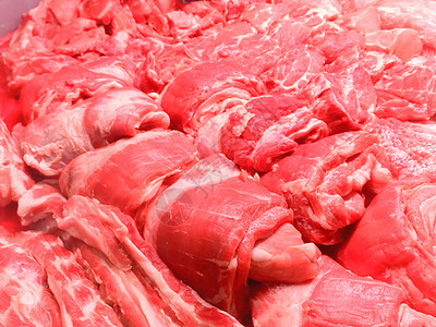 屠宰场的牛肉和猪肉牛排背景图片