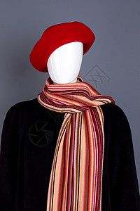 红色贝雷帽围巾和黑色大衣穿着红色女头饰彩色围巾和外套的模特秋图片