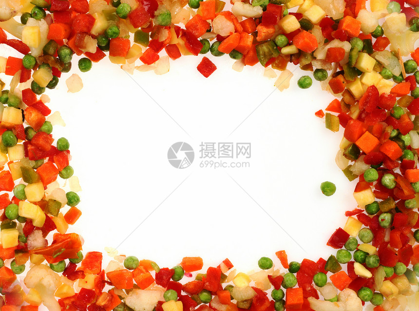 在白色的不同的冷冻蔬菜框架图片