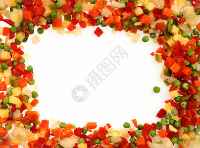 在白色的不同的冷冻蔬菜框架背景图片