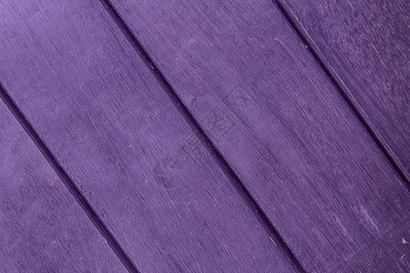 紫色摘要木甲板的背景纹理与有缝图片