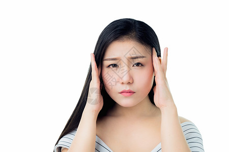妇女触摸头部以示头痛其原因可能是压力或图片