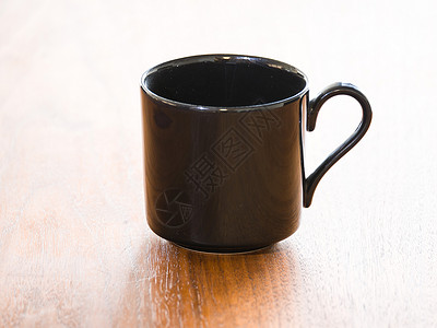 特写一张空的黑色瓷器或陶瓷茶或咖啡杯或子的背景照片图片