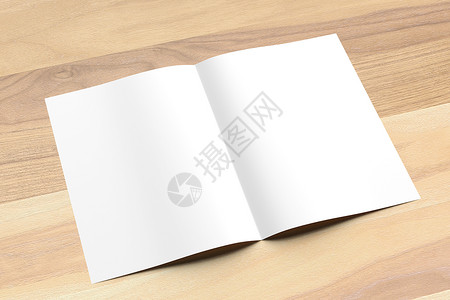 A4尺寸的小册子以木制背景为模型图片